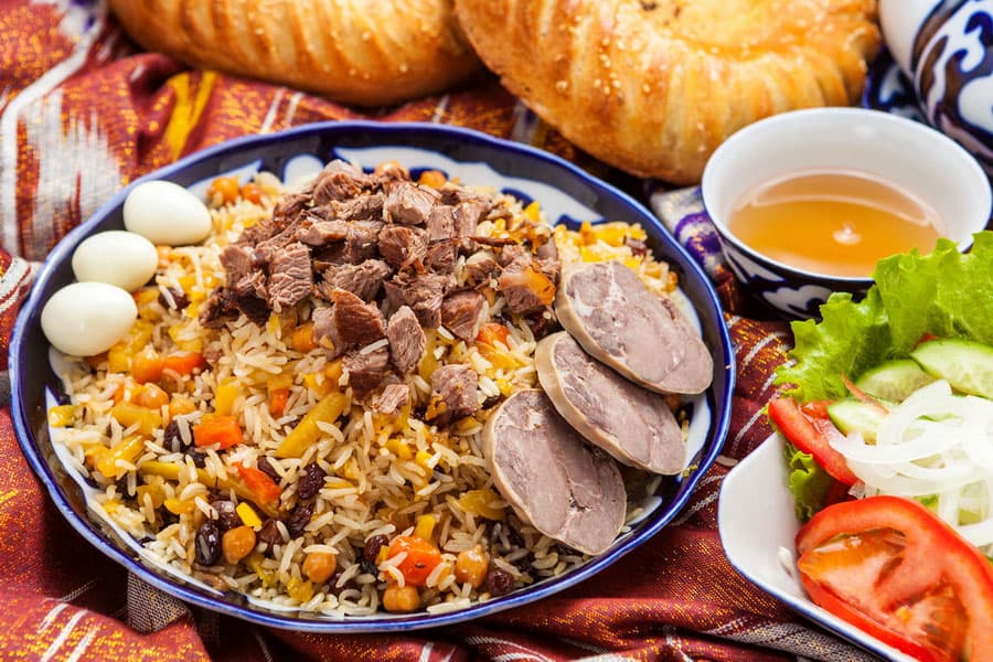 Plov rice with meat and carrots